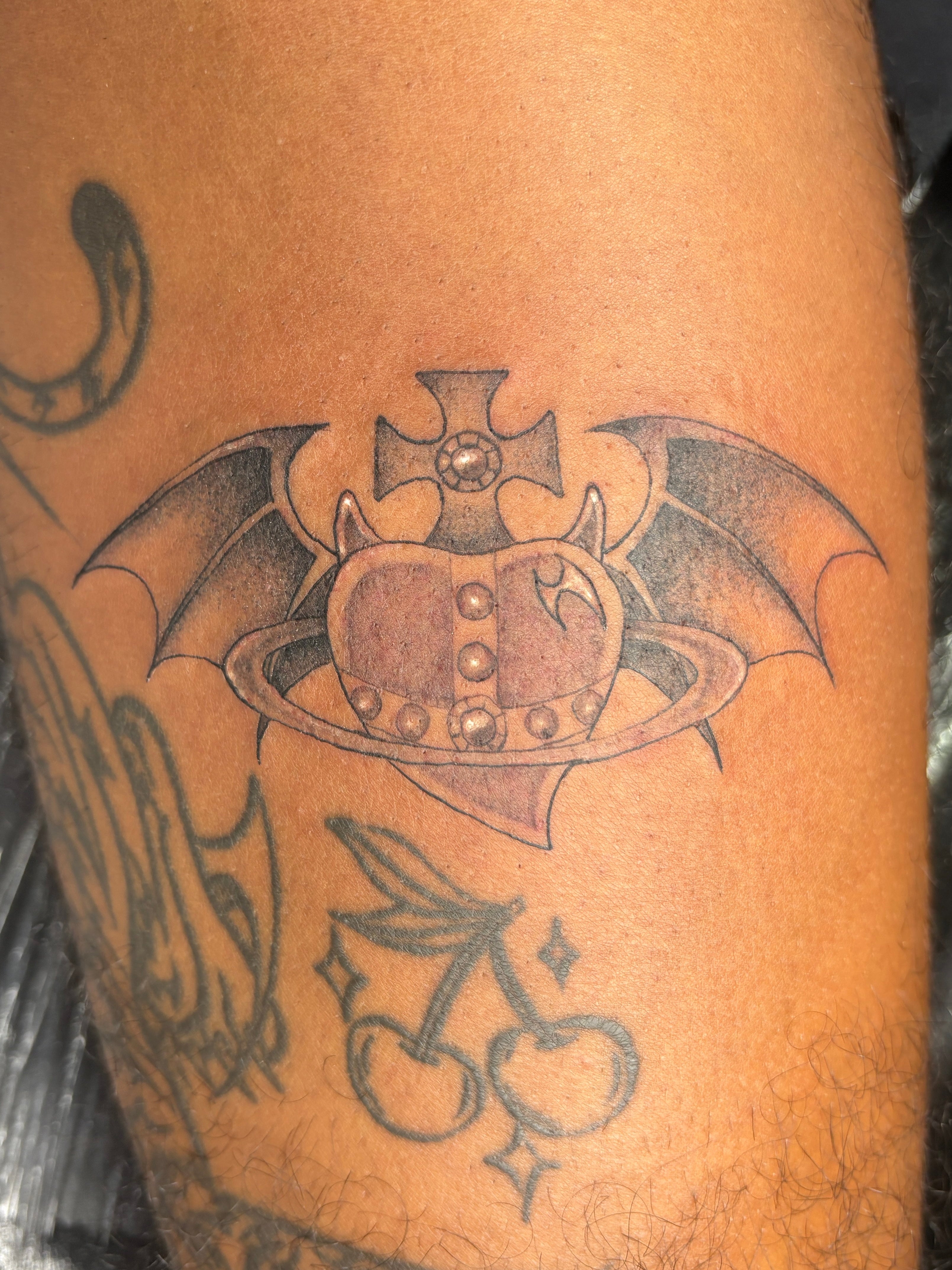 Vivienne Westwood Orb Bat tattoo 